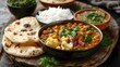 Vegetarian Indian thali with dal cauliflower curry roti and rice. Concept Vegetarian Cuisine, Indian Thali, Dal Curry, Cauliflower Curry, Roti, Rice