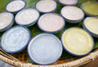 Tasty Thai Dessert of Kanom Tuay Talai or Steamed Coconut Milk Pudding Colored and Fragranced with Butterfly Pea and Taro