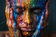 Woman with colorful paint dripping on face