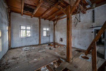 Wall Mural - Exploration of the historic old stone mill with a spiral staircase in Southern Poland, Europe, in Winter