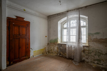 Wall Mural - Exploration the historic old stone mill with a spiral staircase in Southern Poland, Europe, in Winter