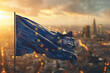 Beautiful waving European Union flag on blurred city background.