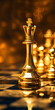 Golden chess set on checkered board with blurry background