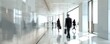 © piai - Interior of modern office and employees in company corridor, motion blur effect
