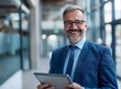 © graphito - smiling middle-aged business man using tablet in office Shot in the style of Nikon D850 with a 24mm f/3 O joyful expression, detailed skin and hair texture