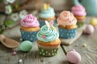 Delicious cupcakes with colorful frosting on a table, perfect for bakery or celebration concepts