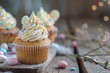 A close up of a delicious cupcake with colorful frosting and sprinkles. Perfect for bakery or dessert concepts