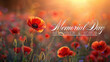 Poppies in a field with memorial day - remember and honor text overlay during sunset