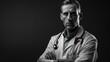 Black and white photorealistic studio portrait of a male medical doctor on black background