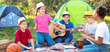 © Pixel-Shot - Group of children resting at summer camp