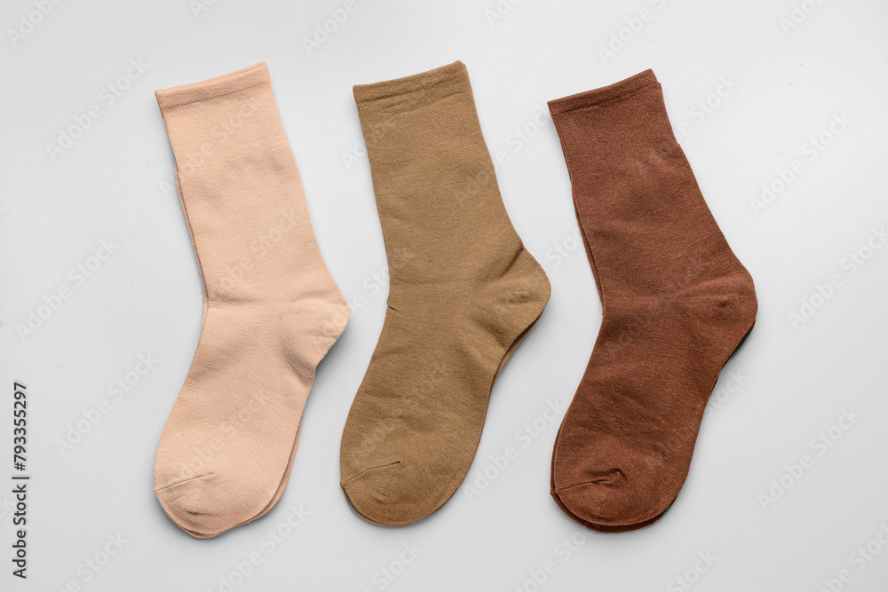 Basic color socks on beige background