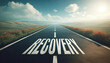 © ChristacilinCreative - A long road with the word RECOVERY painted in white on its surface wallpaper background