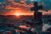 Memorial Day, Poignant Sunset Over A Battlefield Cross Made With Soldier's Boots And Dog Tags