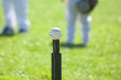 © catahula - Baseball T ball on Tee, grass background