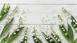 A lovely arrangement of lily of the valley blooms set against a crisp white wooden backdrop This floral spring design serves as a perfect template for crafting your own greeting card Captur