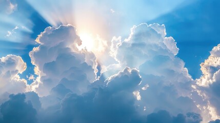 Poster - Cloudy sky with sun shining through white fluffy clouds and blue sky