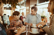 © Davor - Family enjoying time together at a cafe