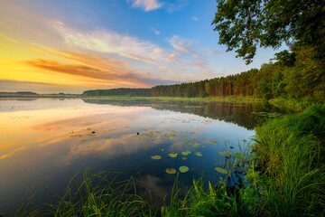 Wall Mural - beautiful summer sunset over the lake