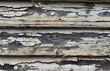 © Juan Gomez - Peeling paint on wooden planks; ready for repair and repainting.