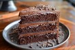 A superb chocolate cake with rich ganache and layers of chocolate crumbs.