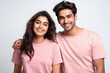 © Niks Ads - Young couple in pink color t shirts on white background
