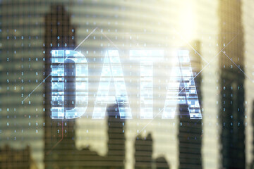 Wall Mural - data word hologram on blurry cityscape background, big data and blockchain concept. multiexposure
