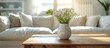 A flowerpot with flowers decorates a wooden table in the living room
