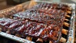 Delicious baby back ribs smoked to perfection and served in a foil tray