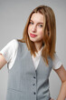 © fotofabrika - Young Woman Wearing Gray Suit and White Shirt