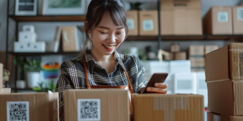 Package, startup, and Asian woman with phone for fashion boutique company. Networking, technology and young female entrepreneur with cardboard boxes and cellphone for delivery information