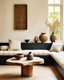 Fototapeta  - Live edge coffee table near corner sofa. Japandi interior design of modern living room, home.