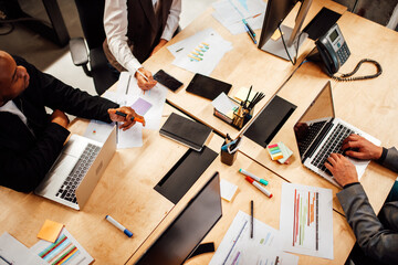 Business people in office work together during a meeting