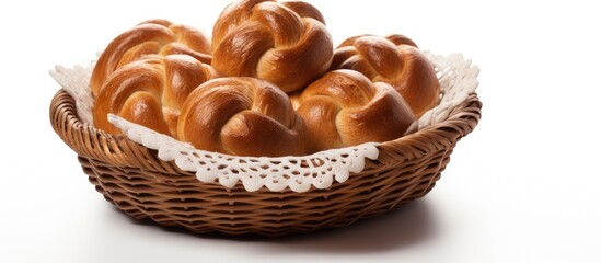 Sticker - A basket filled with assorted bread on a delicate doily