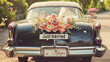 © Laura - vintage wedding car with flowers