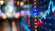 © Plaifah - Close-up of a computer screen displaying fluctuating stock prices on a dynamic graph, illustrating market volatility.