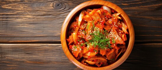 Wall Mural - A bowl of food and a wooden spoon