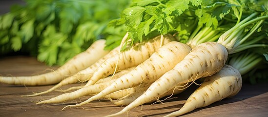 Canvas Print - Bunch of carrots with green leaves on table