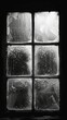 © duyina1990 - Black and white photo of a window covered in frost