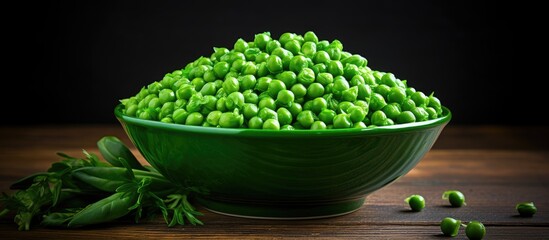 Canvas Print - Bowl of green peas on a wooden table