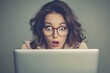 © milkyway - Surprised Professional Woman Discovering Something Unexpected on Laptop Screen