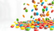 Many flying candies on white background