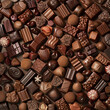 Fondo con detalle y textura de multitud de bombones de chocolate