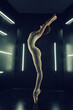 ballerina in a bodysuit and tights poses stretching in a dark photo studio in the light of lamps