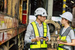 © Quality Stock Arts - Engineer train engine service team man and women talking consulting together at train depot locomotive industry people