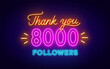 Neon message Thank You 8000 Followers on dark background