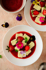 Wall Mural - Curd Lazy dumplings with strawberry sauce.top veiw.style hugge