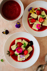 Wall Mural - Curd Lazy dumplings with strawberry sauce.top veiw.style hugge