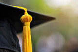Fototapeta Góry - Close up of graduation cap and tassel, concept of graduation 