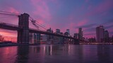 Fototapeta  - Sunset view of Brooklyn Bridge with Manhattan skyline in the background