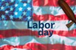 Labor Day Celebration Concept with American Flag Background